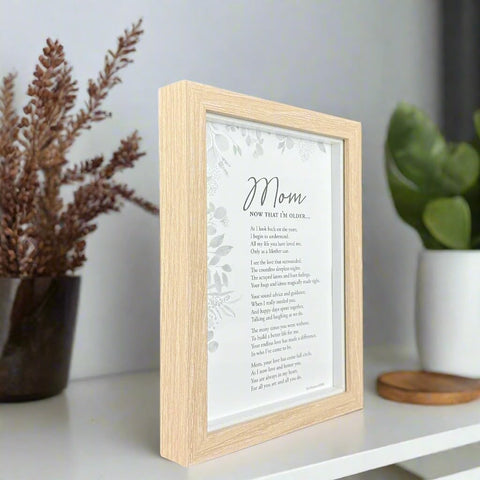 The Grandparent Gift Co. scale image with hands, demonstrates compact 5 x 7 size