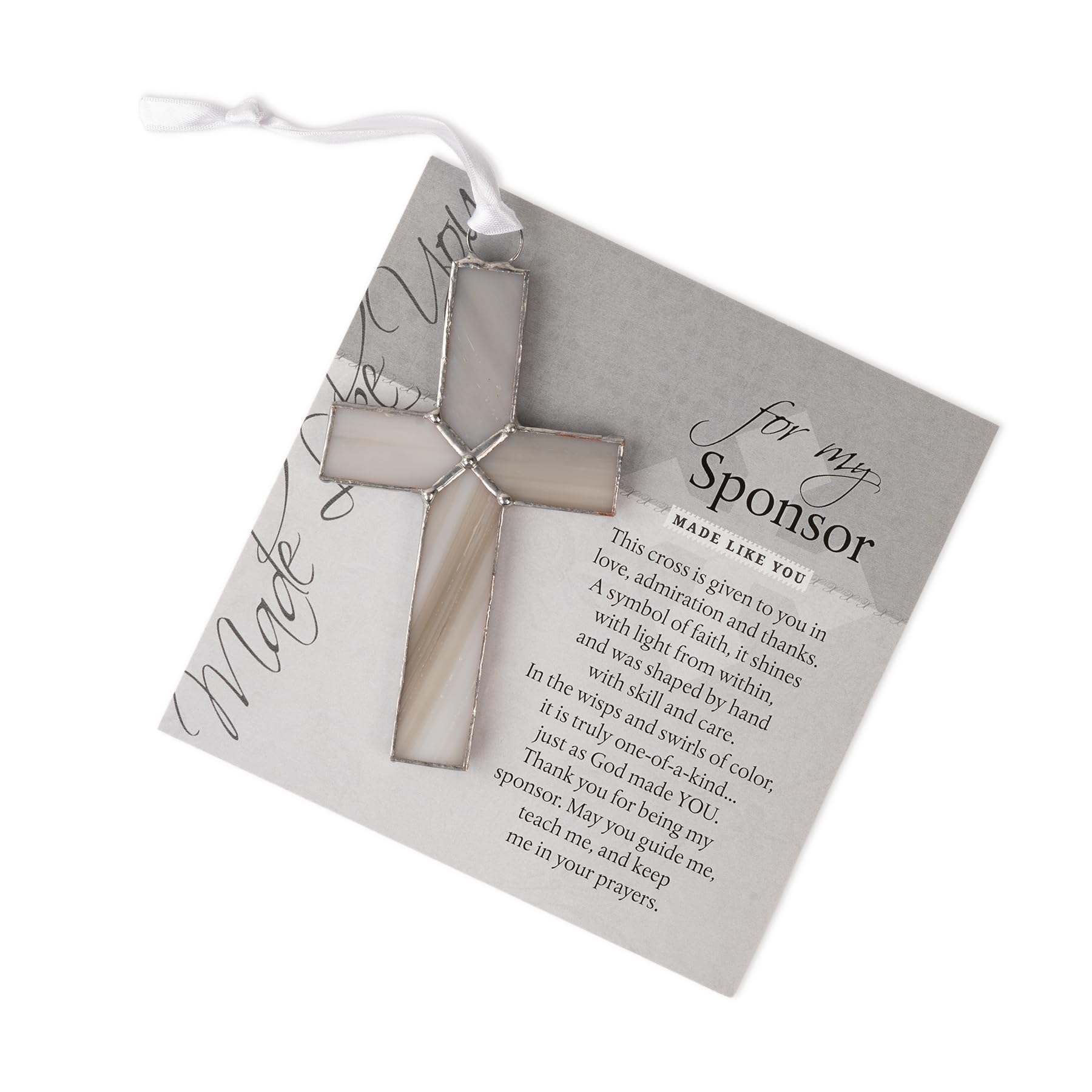The Grandparent Gift Co. cross as suncatcher in window bringing colorful light benefits