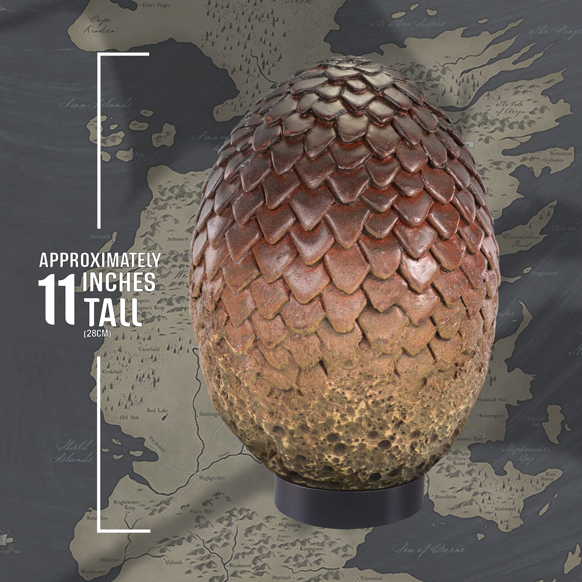 The Noble Collection Drogon egg next to ruler for scale showing 8-inch size clarity