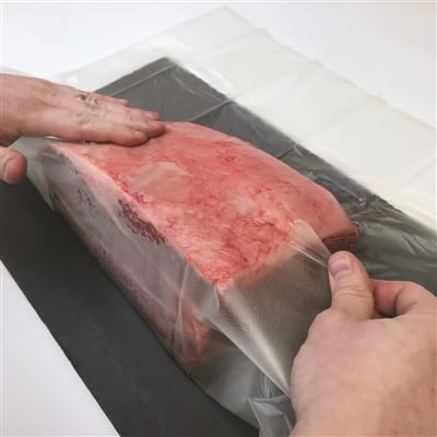 The Sausage Maker wrapped whole ham in smokehouse showing protection and smoke penetration