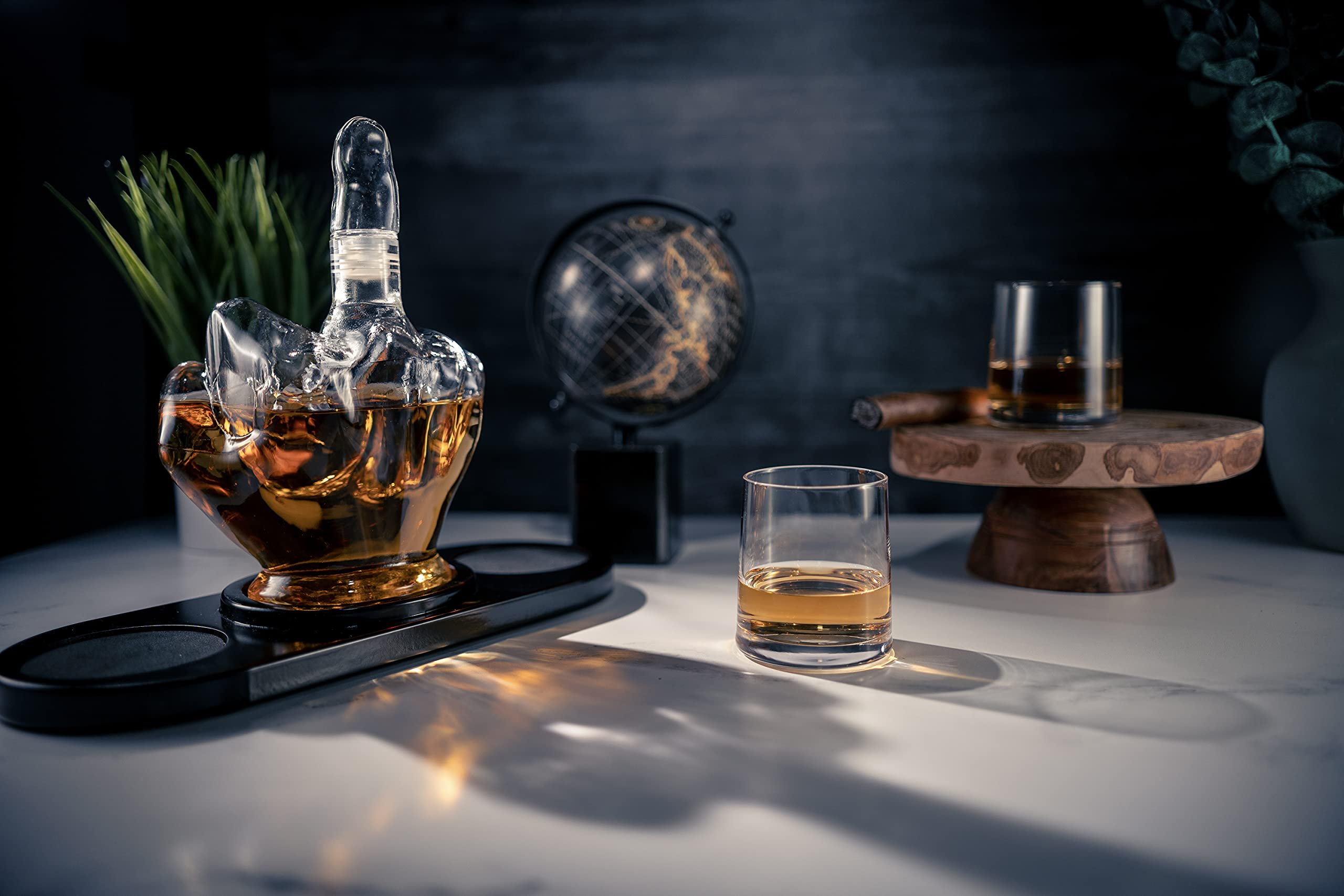 The Wine Savant decanter next to standard liquor bottle showing 750ml scale