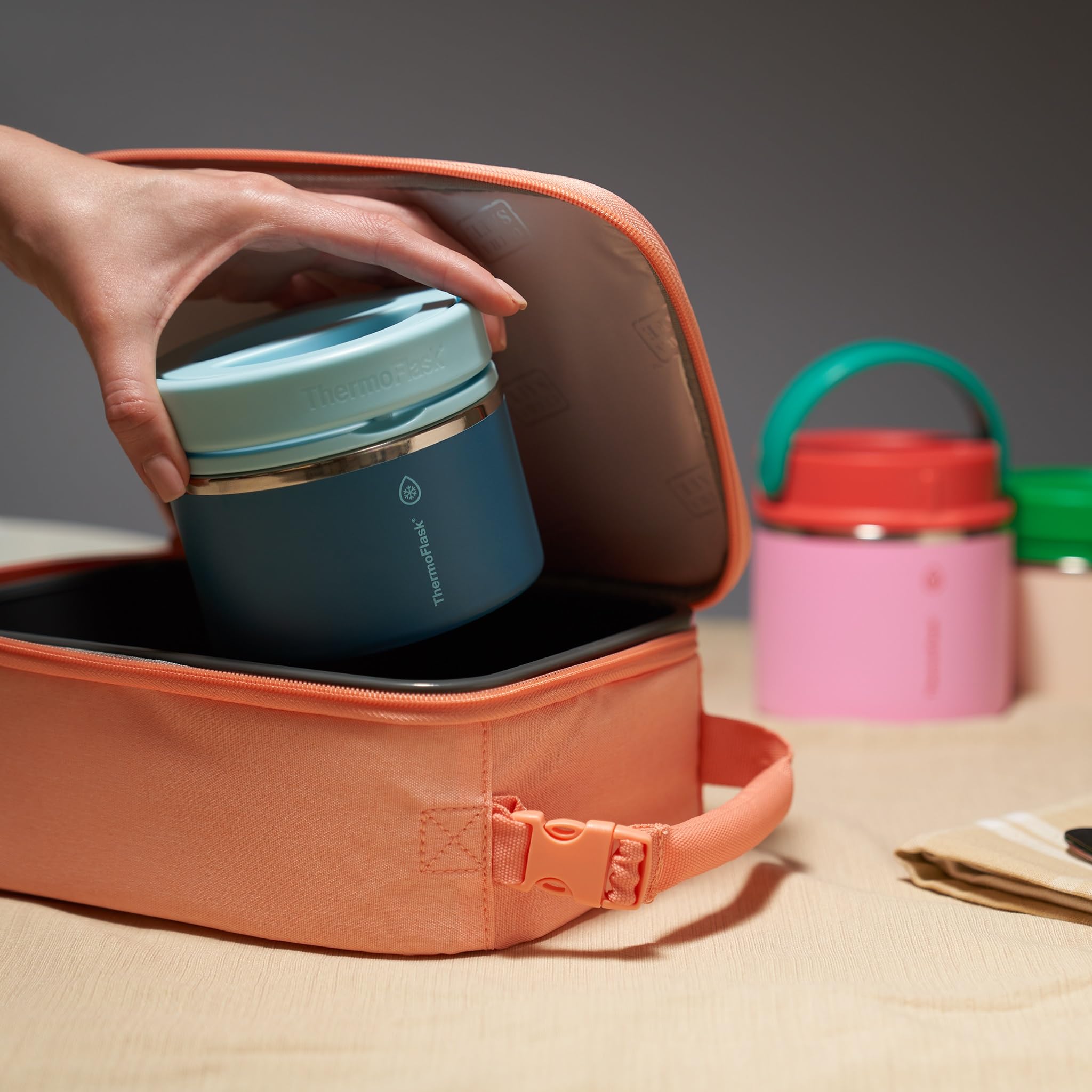 ThermoFlask food jar inside a lunchbox showing insulated meal ready for work