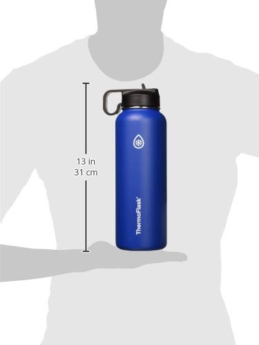 ThermoFlask on a hiking trail showing durable construction for outdoor use