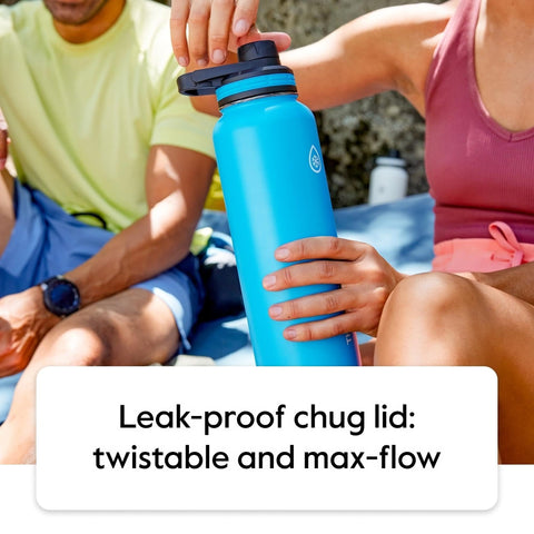 ThermoFlask secured in bike bottle cage showing travel-ready stability