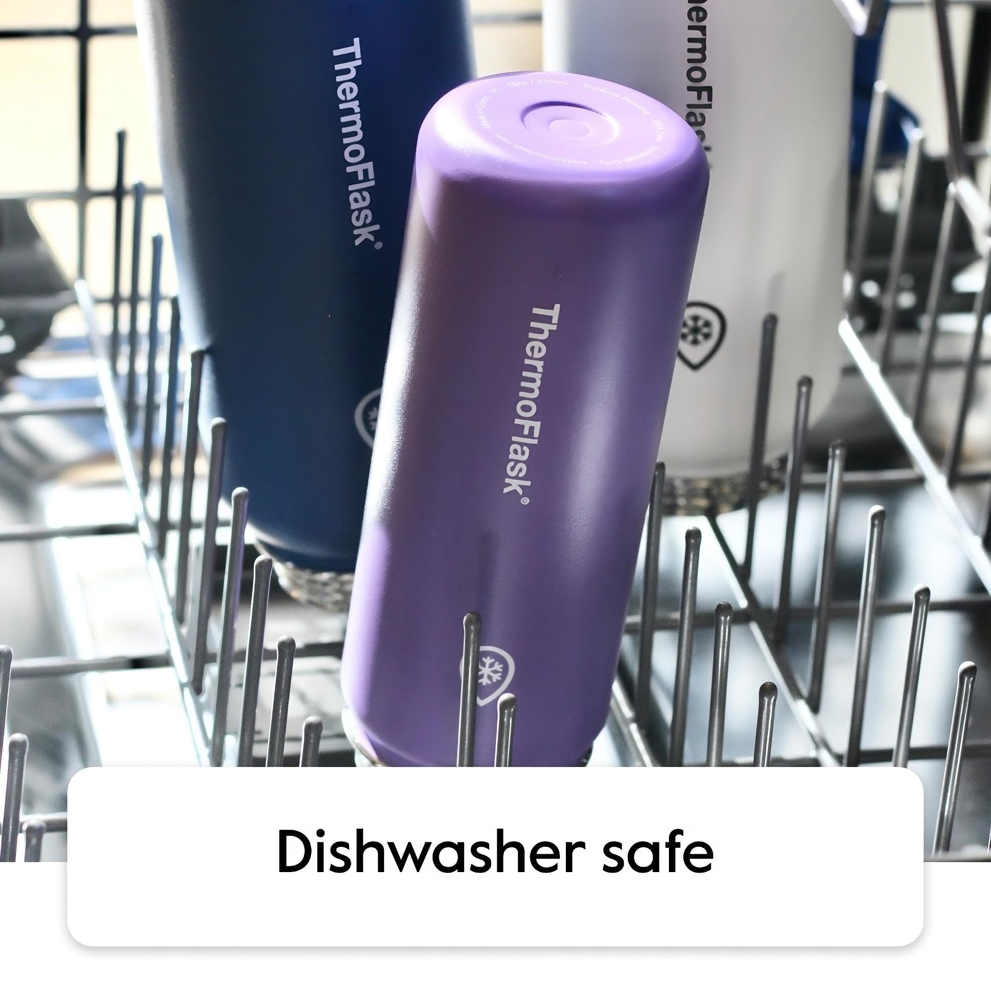 ThermoFlask straw lid being used hands-free showing convenient sipping benefit