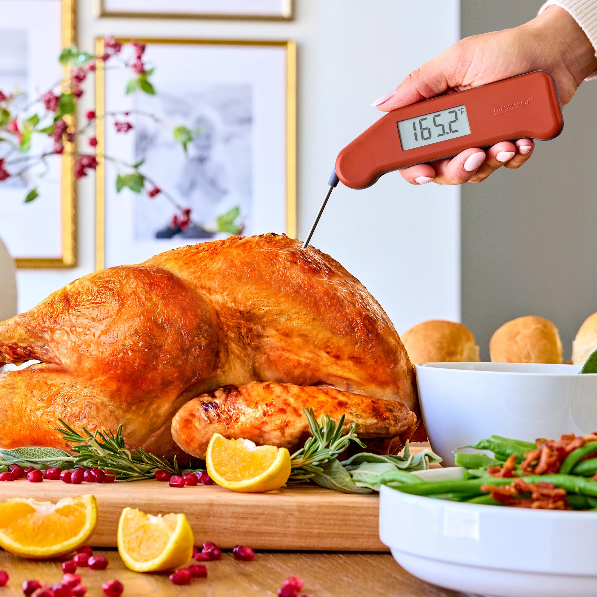 ThermoWorks Thermapen with calibration certificate showing verified accuracy
