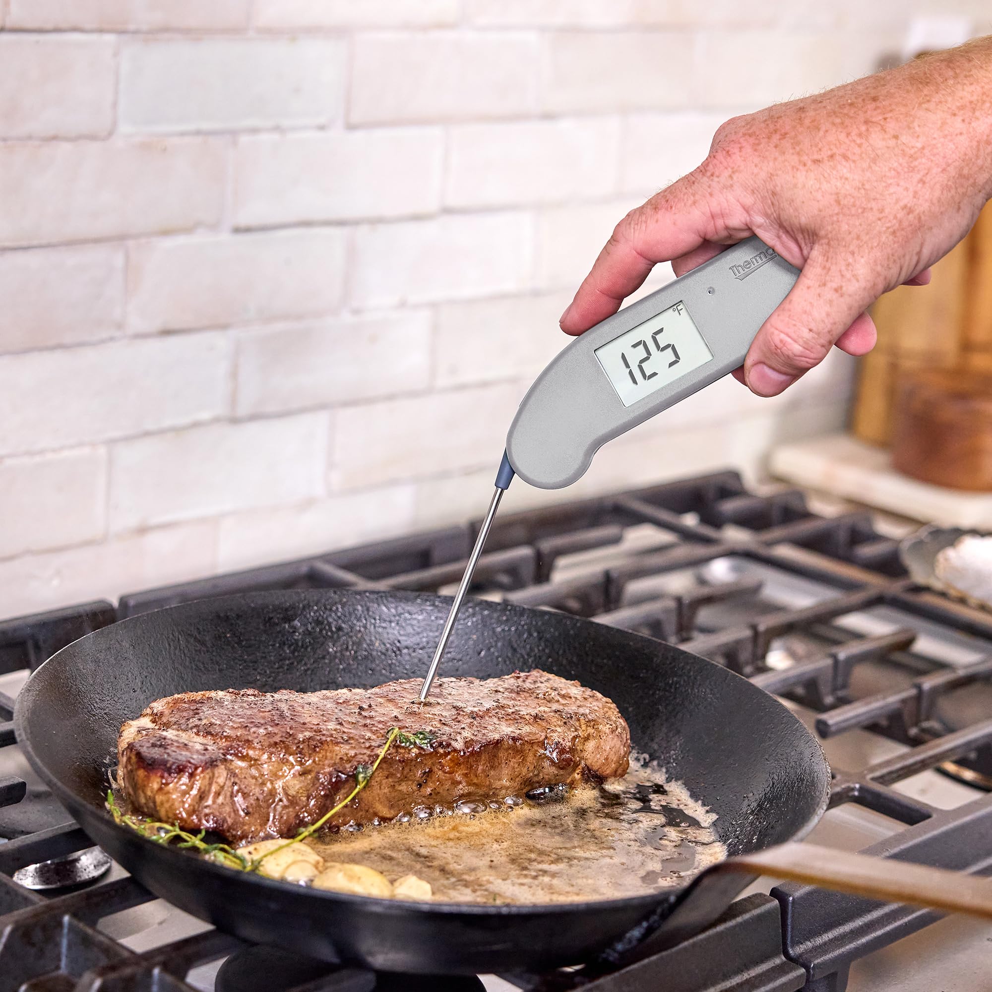 ThermoWorks Thermapen ONE stainless steel probe close-up highlighting fast response benefit