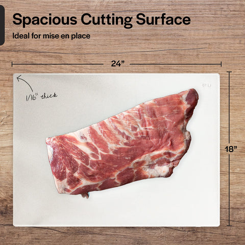 Thirteen Chefs mat being flexed to funnel chopped vegetables, improving transfer speed