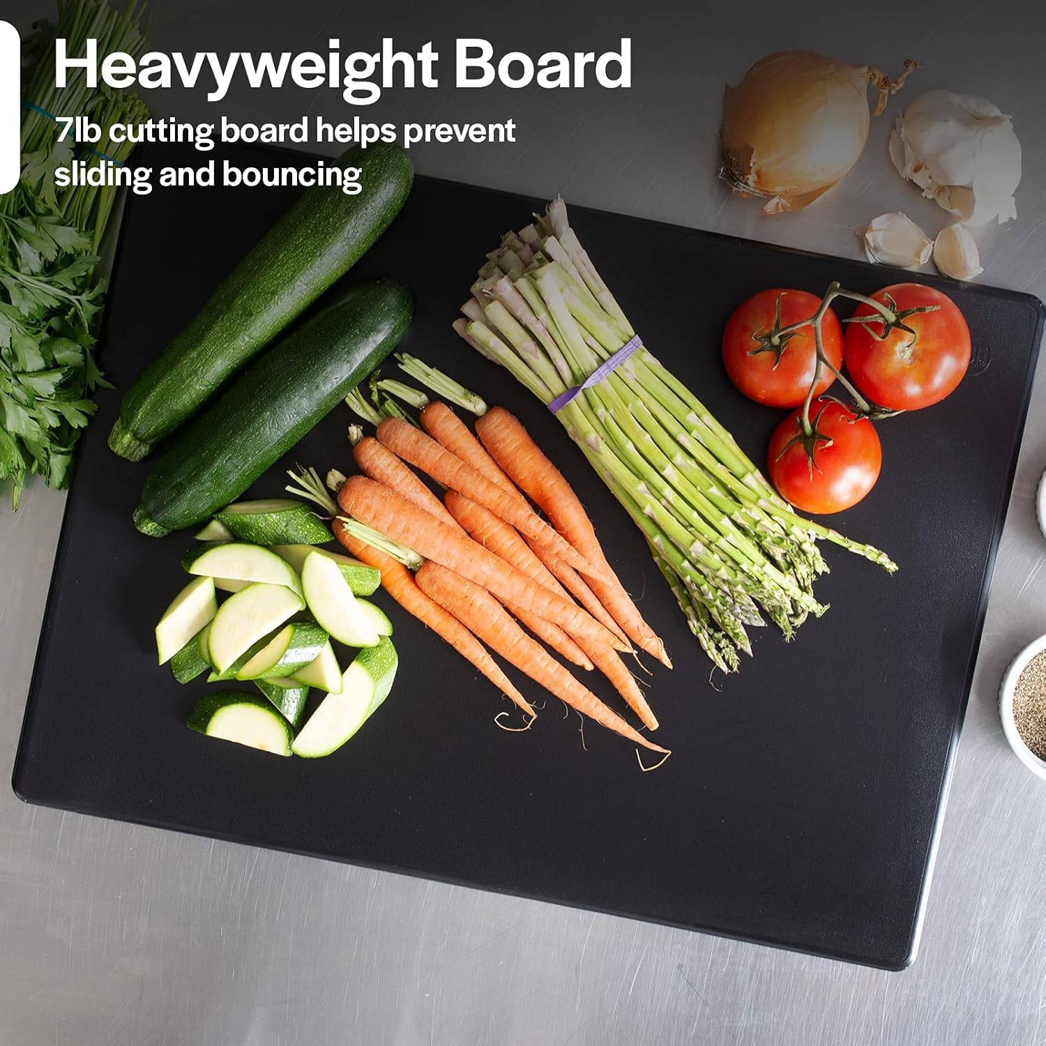 Thirteen Chefs cutting board in use with roast and chef knife for efficient prep