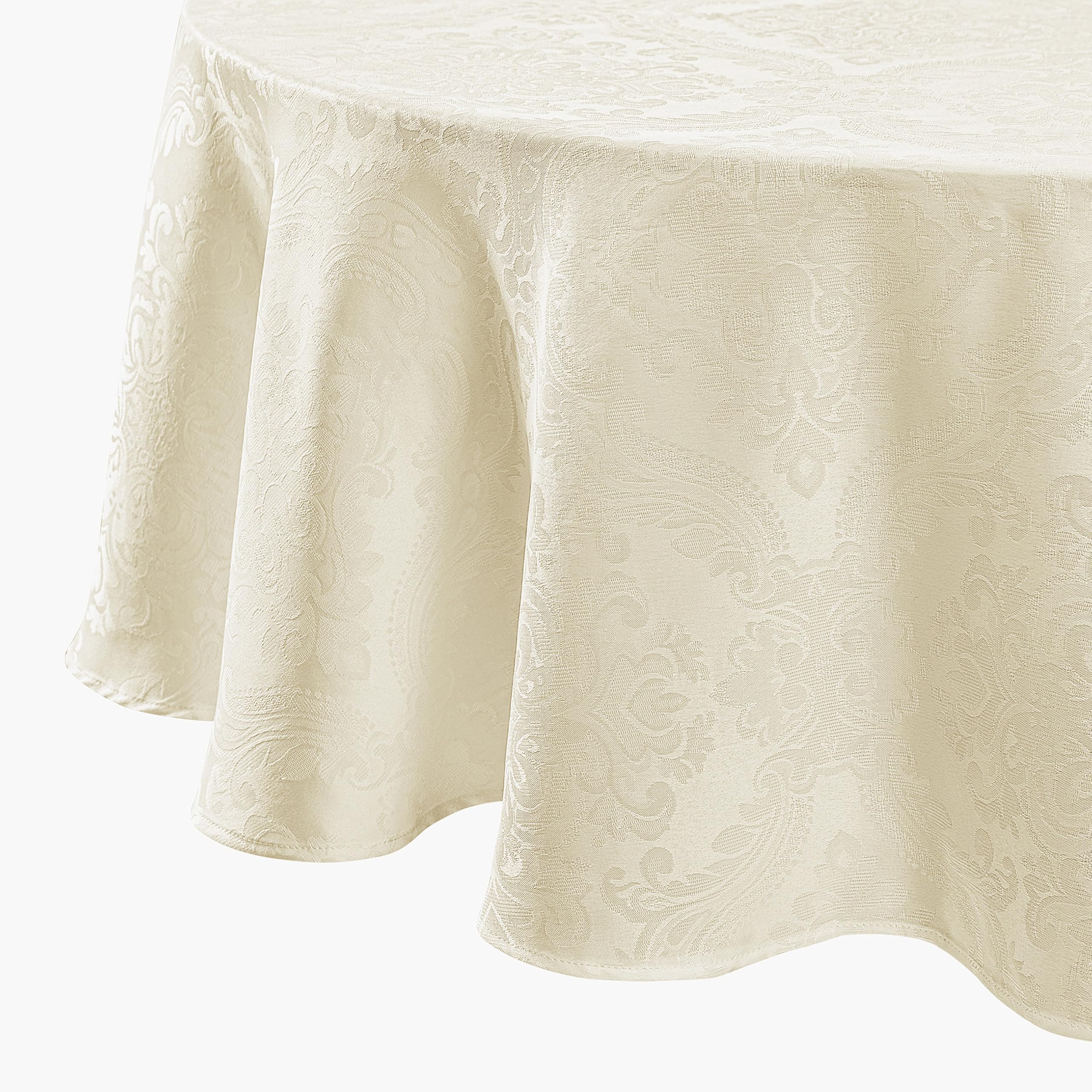 Threadmade Caiden front view on round table showing elegant ivory finish and upscale look