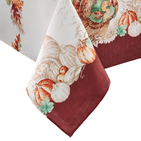 Threadmade front view of full tablecloth showing turkey border and clean white center, perfect focal point
