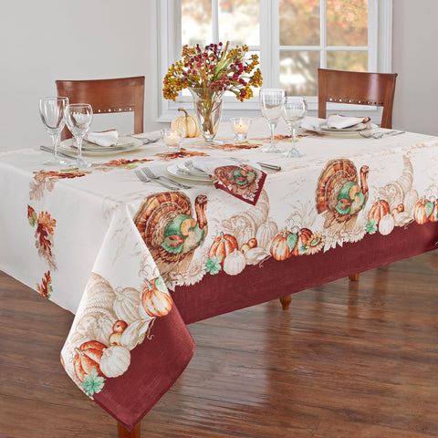 Threadmade close-up of turkey border print showcasing warm fall hues and detailed harvest motif