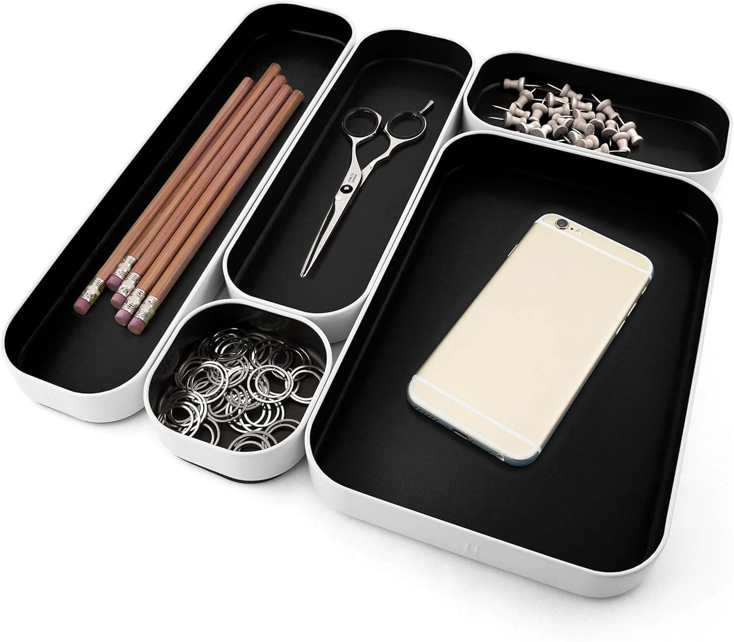 Three by Three Seattle trays arranged inside a vanity drawer to maximize space