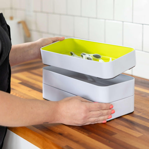 Three by Three Seattle trays holding rings, brushes, and lipstick for tidy daily use