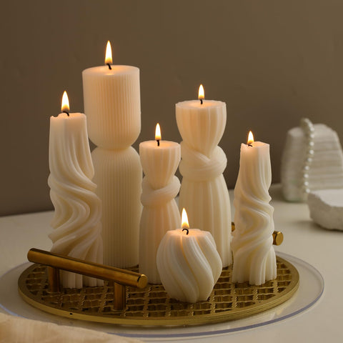 Threlaco lit candles arranged on a table showing warm ambiance for evenings