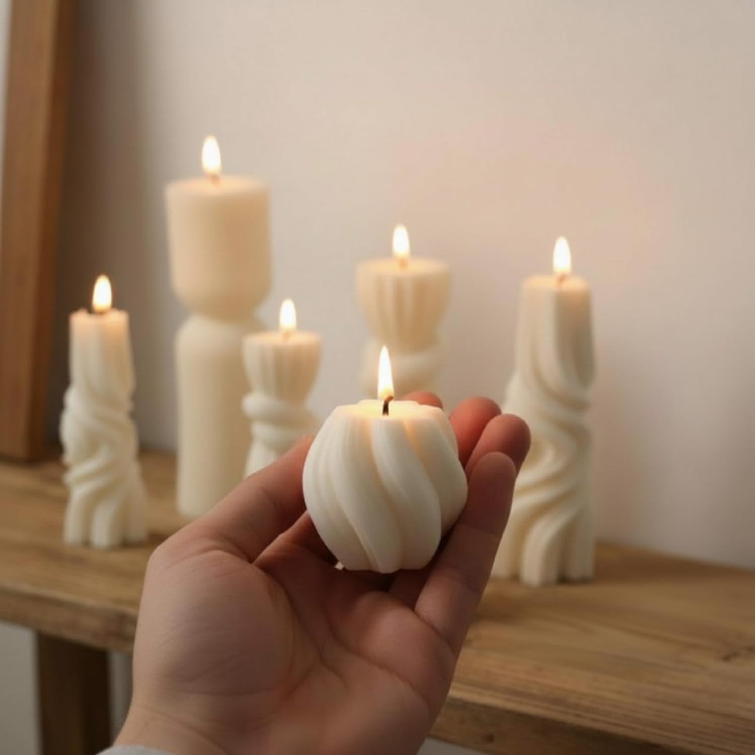 Threlaco group of candles staged for scale illustrating size variety for layered displays