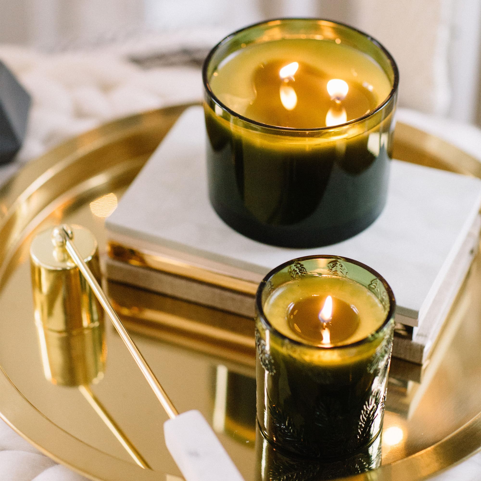 Thymes Frasier Fir candle in living room adding cozy evergreen atmosphere