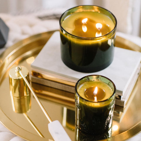Thymes Frasier Fir candle in living room adding cozy evergreen atmosphere