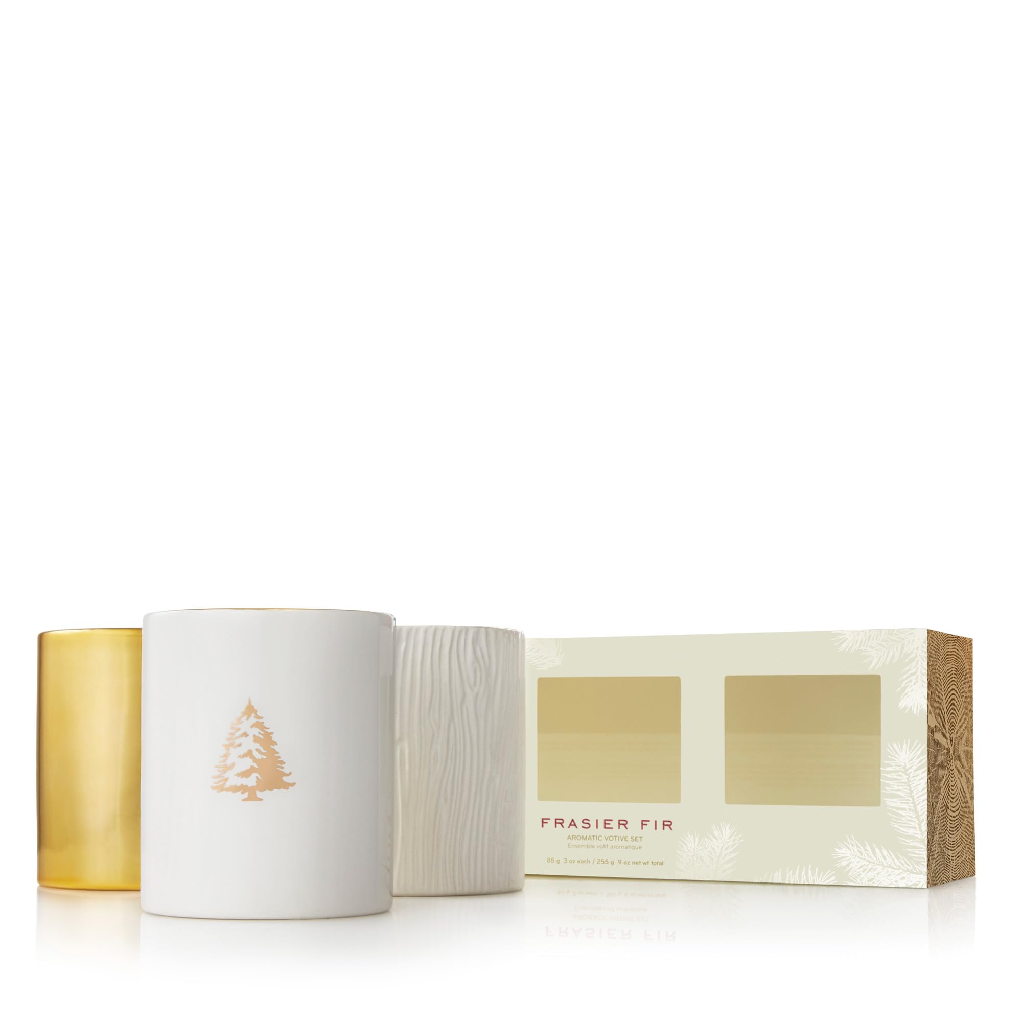 Thymes votive front packaging showing three decorative ceramic candles and benefit: instant holiday style