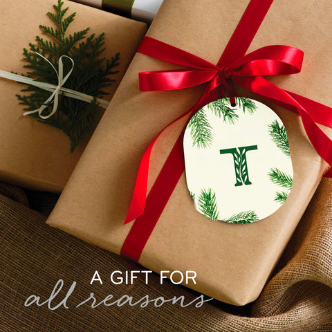 Thymes Frasier Fir styled on a mantel as a gift-ready seasonal decor benefit