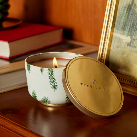Thymes Frasier Fir gold lid detail showing polished finish and protection