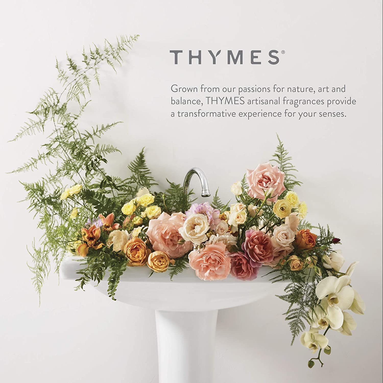 Thymes Frasier Fir on a mantel with greenery evoking holiday atmosphere
