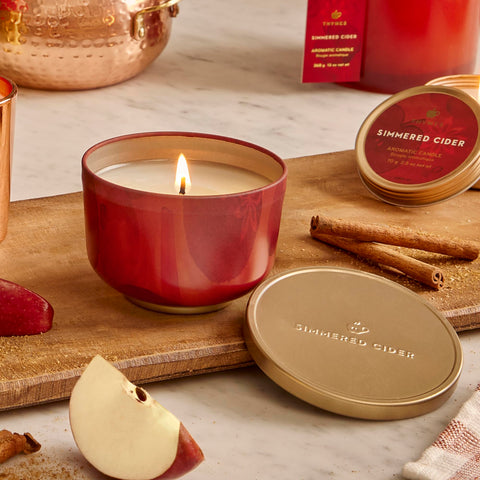 Thymes gold lid closeup highlighting secure seal and travel-friendly design