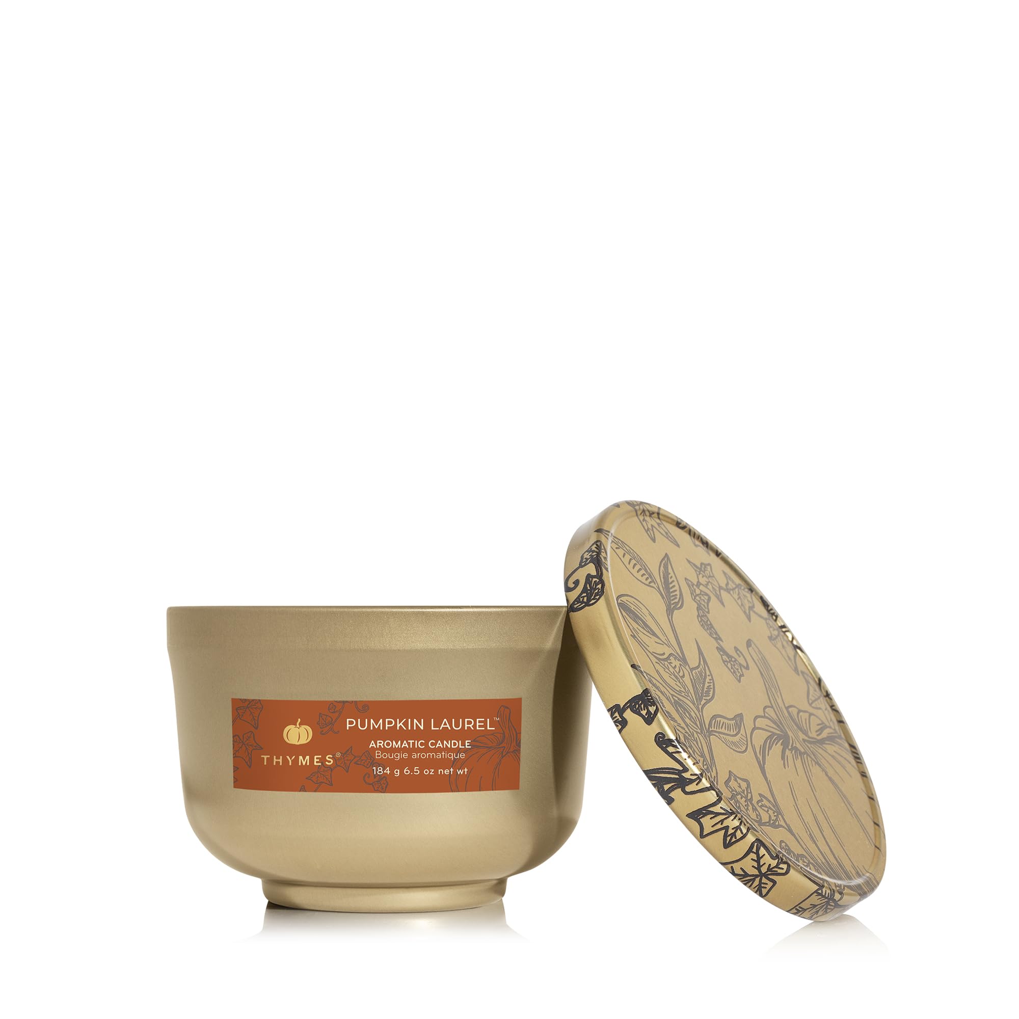 thymes tin candle front view showcasing seasonal pumpkin scent and compact size