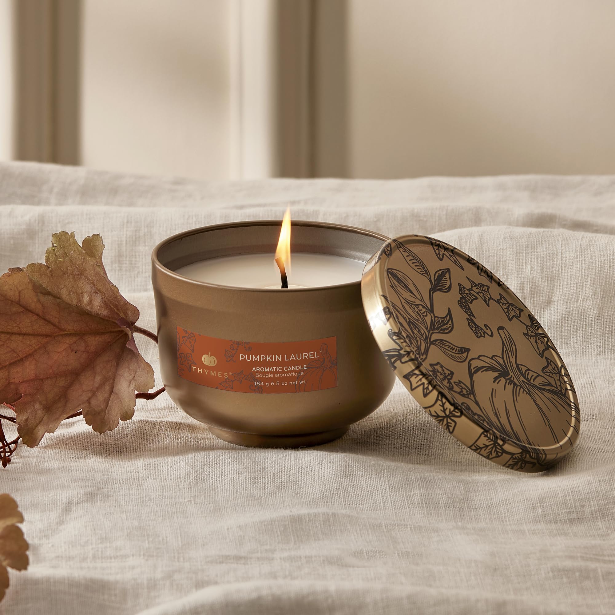 thymes gold lid close-up with hand-drawn botanicals accenting decor