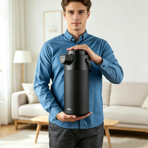 Tiken airpot pump closeup revealing ergonomic pump and drip-resistant pour benefit