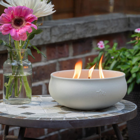 TIKI wick and flame detail illustrating steady burn and clear ambient lighting benefit