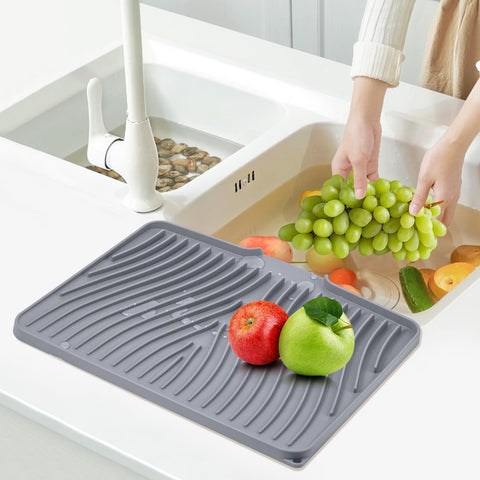 TIKNIK mat with dishes in use preventing slips and pooling