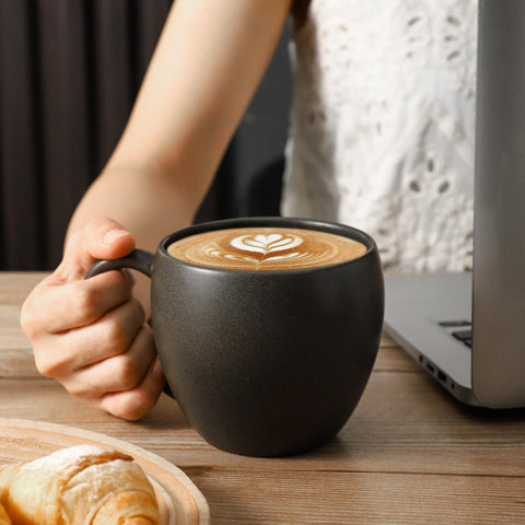 Tikooere mug handle detail demonstrating ergonomic grip and comfort