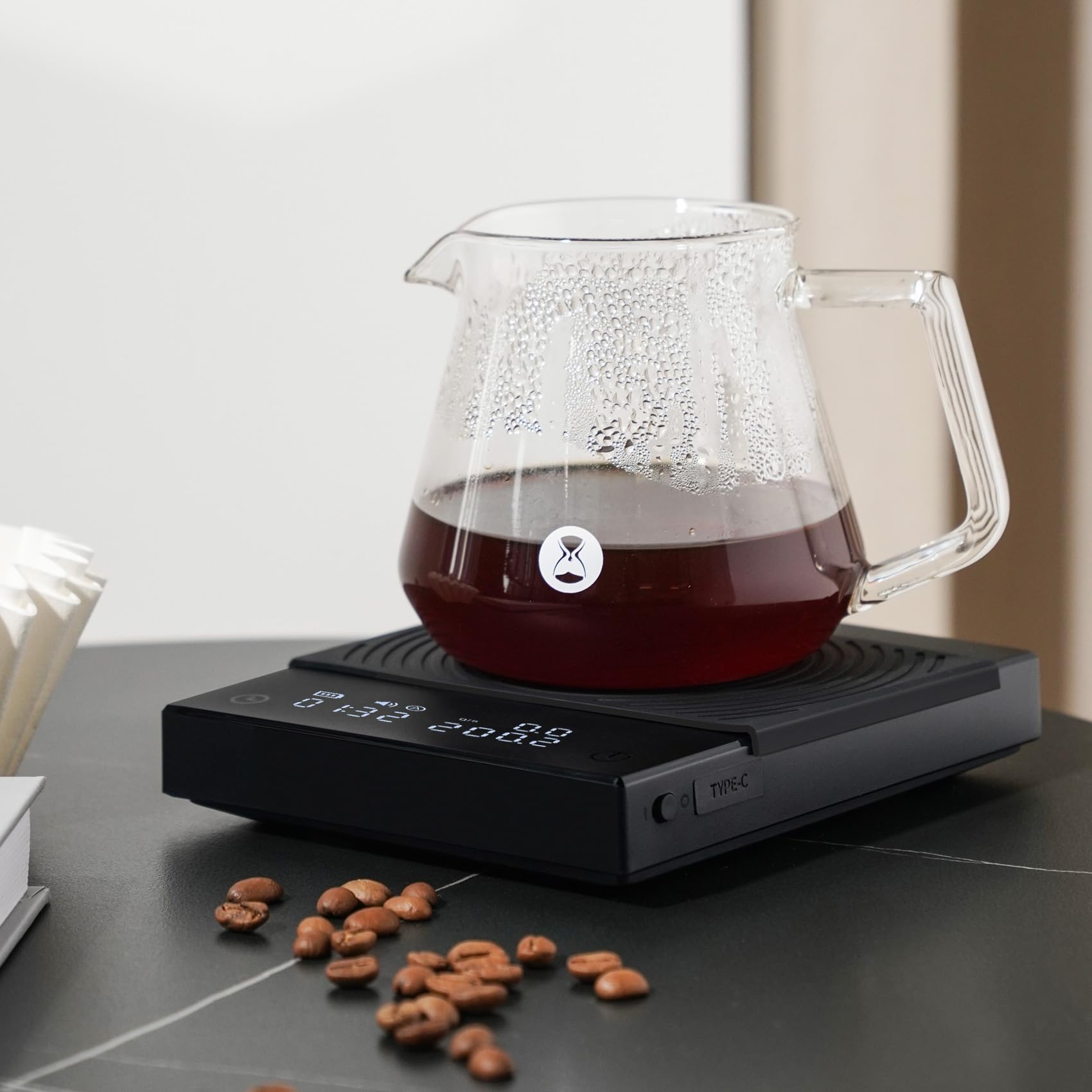 TIMEMORE beside an espresso cup to show scale size and countertop fit