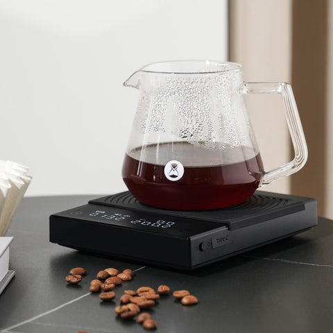 TIMEMORE beside an espresso cup to show scale size and countertop fit