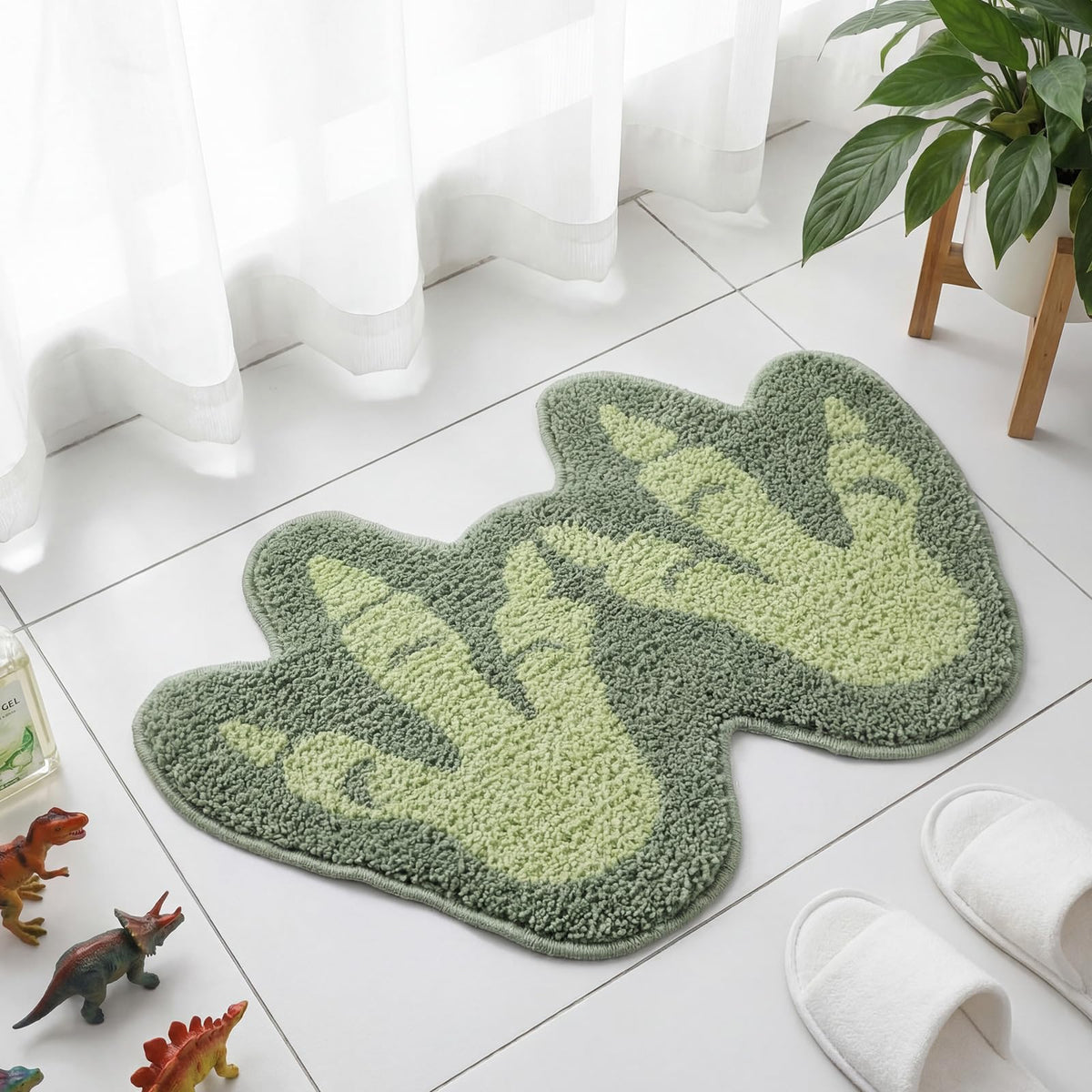Tinideya front view showing aqua green footprint design and inviting soft surface
