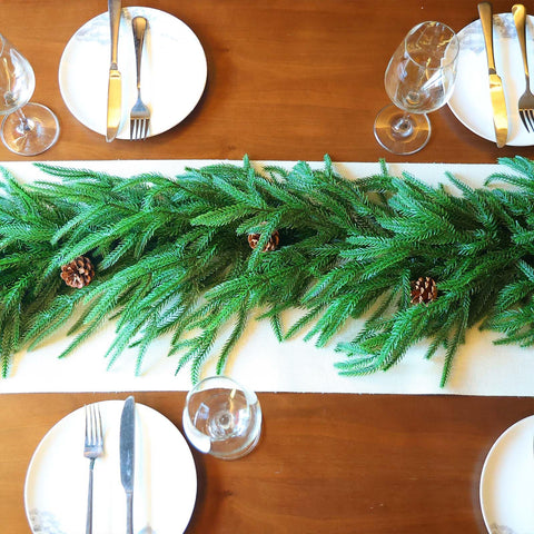 Tixiquns used as table runner with ornaments highlighting centerpiece versatility