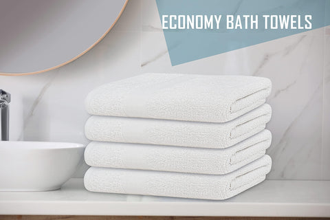 TOALLA towel beside hand and ruler to show accurate 20x40 inch size and practical scale