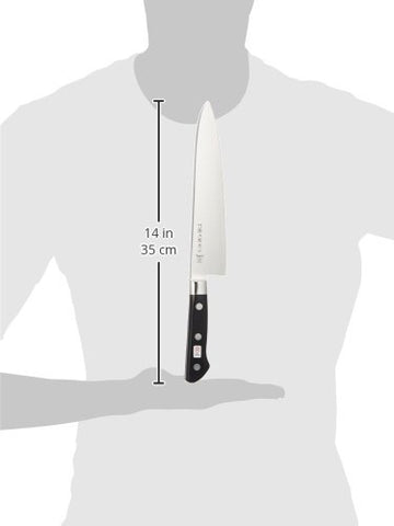 Tojiro knife in kitchen use slicing vegetables for faster prep and precision