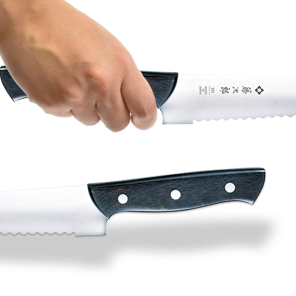 Tojiro knife in use slicing artisan loaf cleanly, showing even cuts and minimal crumbing
