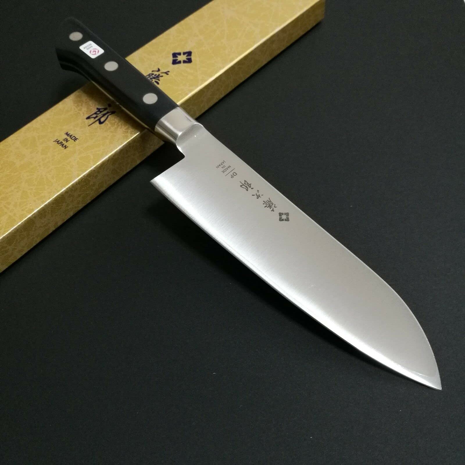 Tojiro Santoku slicing vegetables in kitchen showing precise, even cuts and versatility