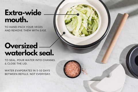 TOMO detailed shot of extra-wide waterlock channel, keeps ferments oxygen-free