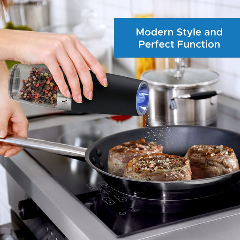 TOMTY blue LED lit while dispensing spices for precise night-time seasoning
