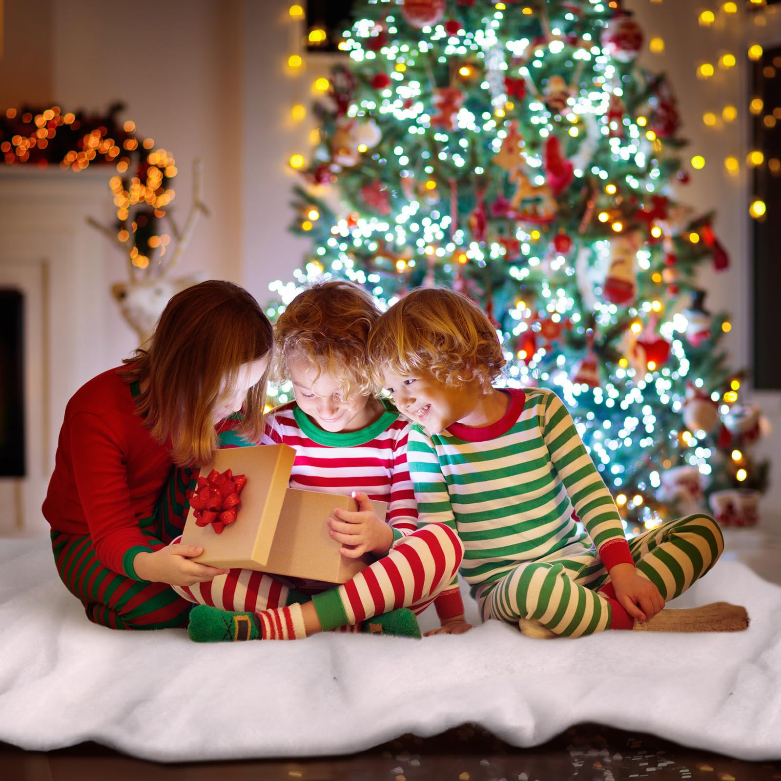 Tondiamo snow blanket used for supervised child play scene adding indoor winter fun