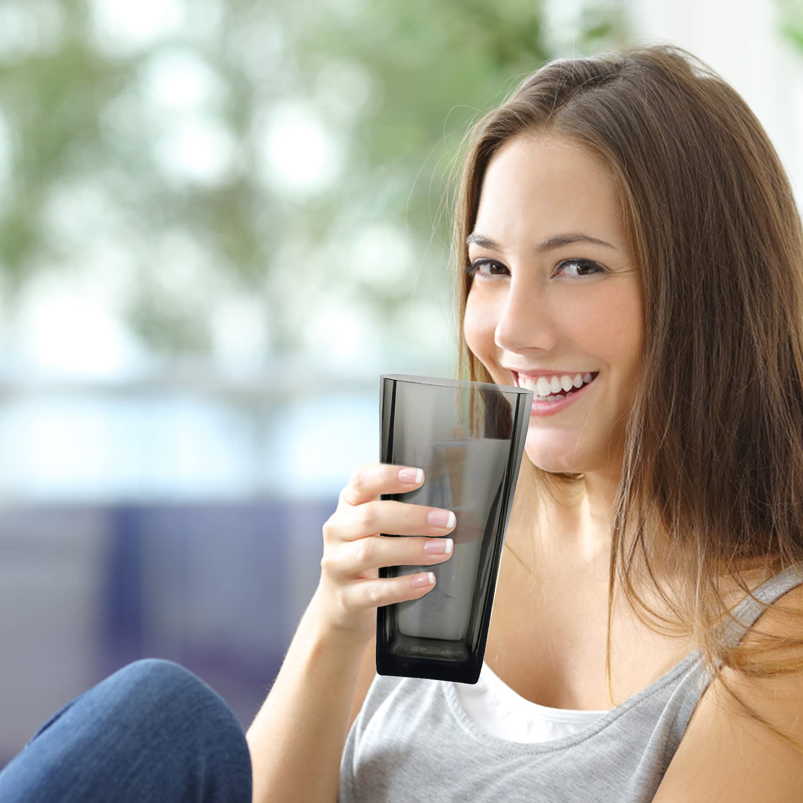 Top-spring tumbler with iced coffee demonstrating beverage presentation benefit