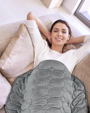Topblan lifestyle image on couch demonstrating relaxation and warmth