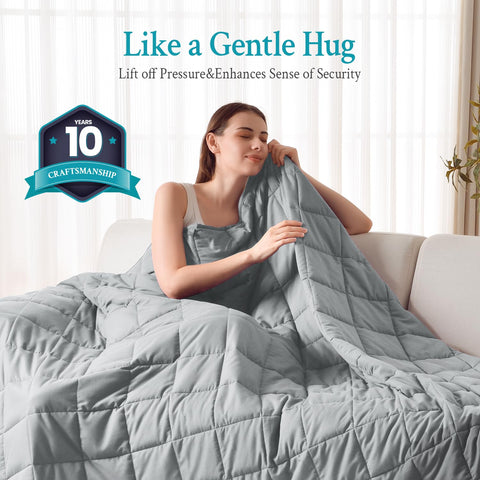 Topblan draped over a twin bed showing breathable cooling comfort benefit