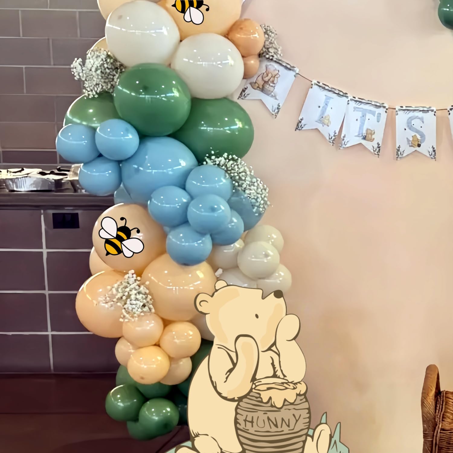 TopJianyu bee stickers on backdrop adding playful finishing touches
