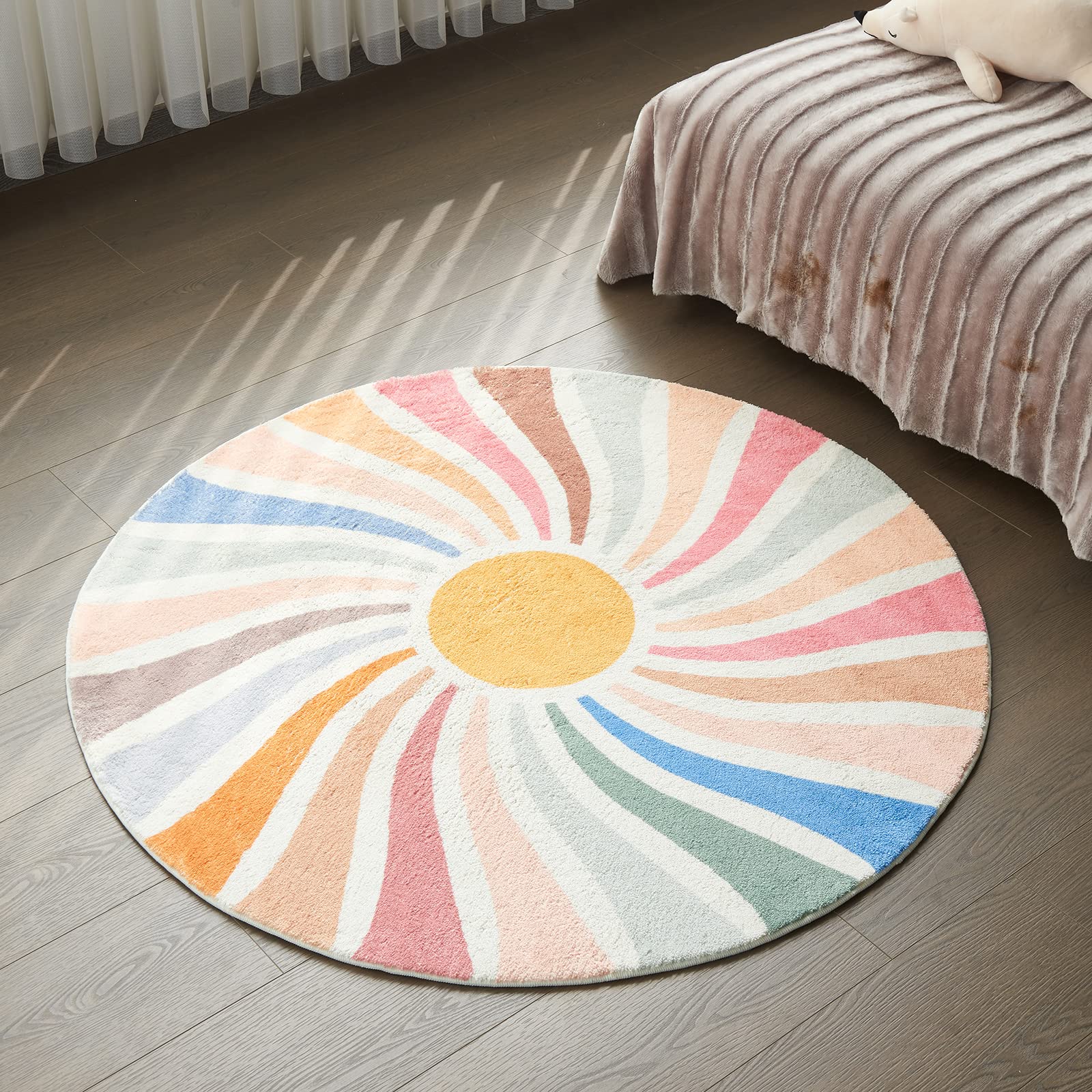 Topotdor front view of round rug adding color and warmth
