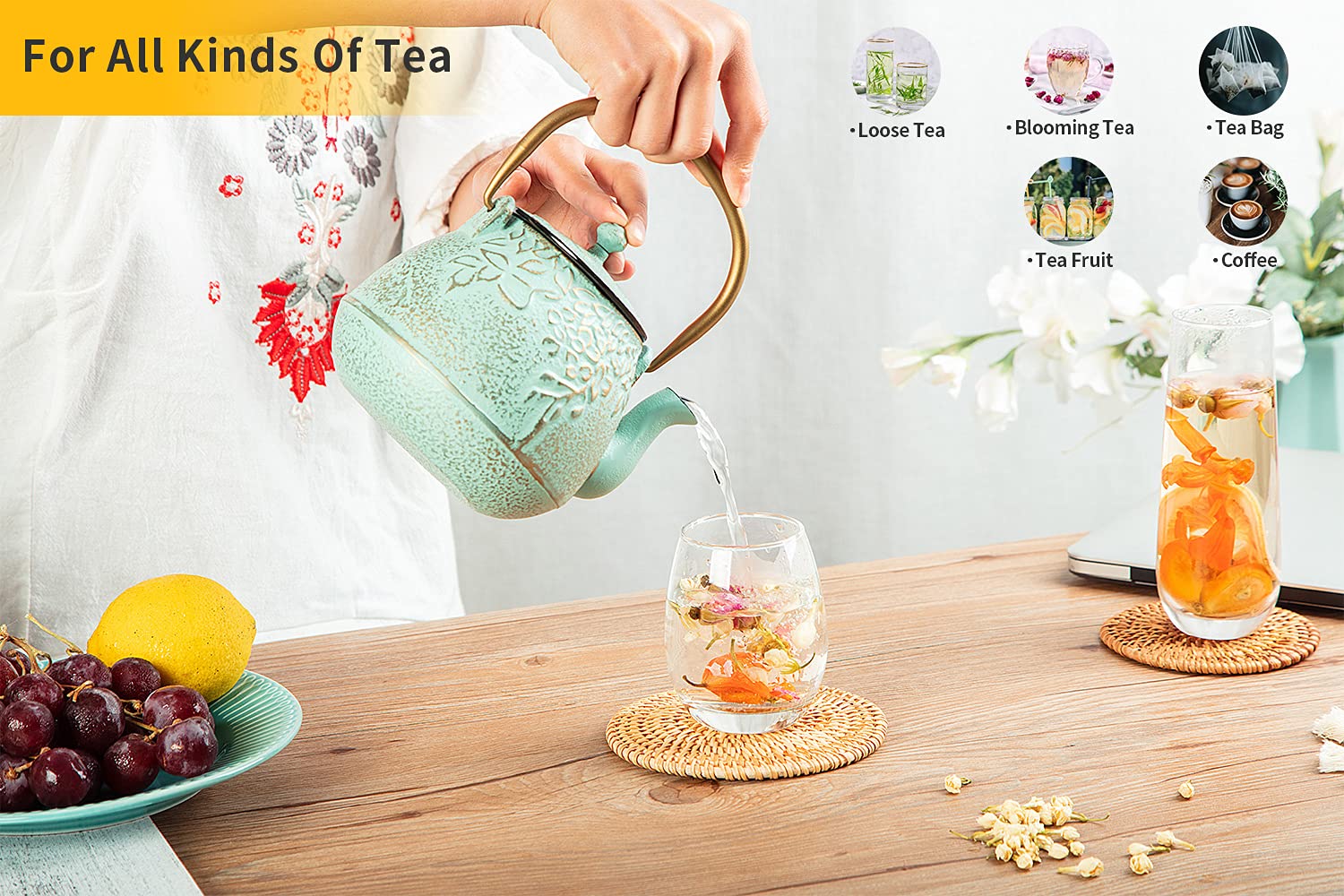 toptier teapot held in hand showing 32oz scale and comfortable grip